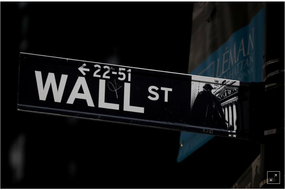  Wall Street closes lower as Fed officials project rate hikes for 2023