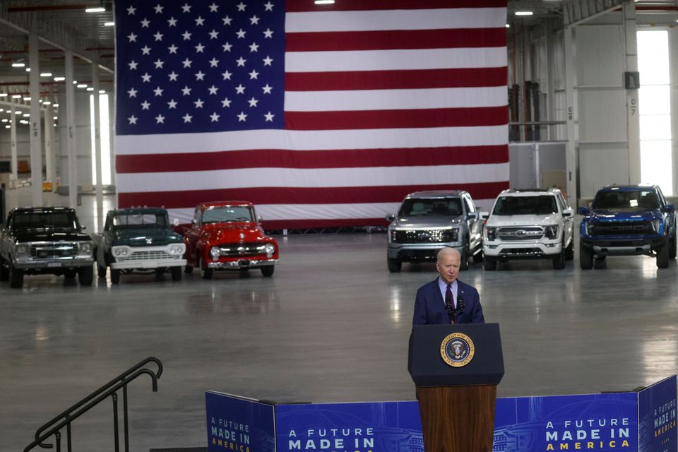  Biden pitches $174 bln EV plan in Michigan, takes truck for a spin