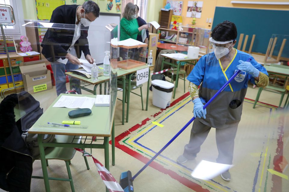  Madrid voters queue at polls in COVID-influenced crunch election