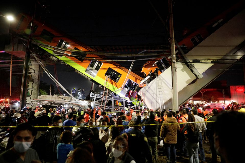  Mexico City rail overpass collapses onto road, killing 20 people