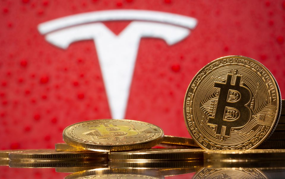  Tesla’s bitcoin value dives; Musk signals hold with ‘diamond hands’ tweet