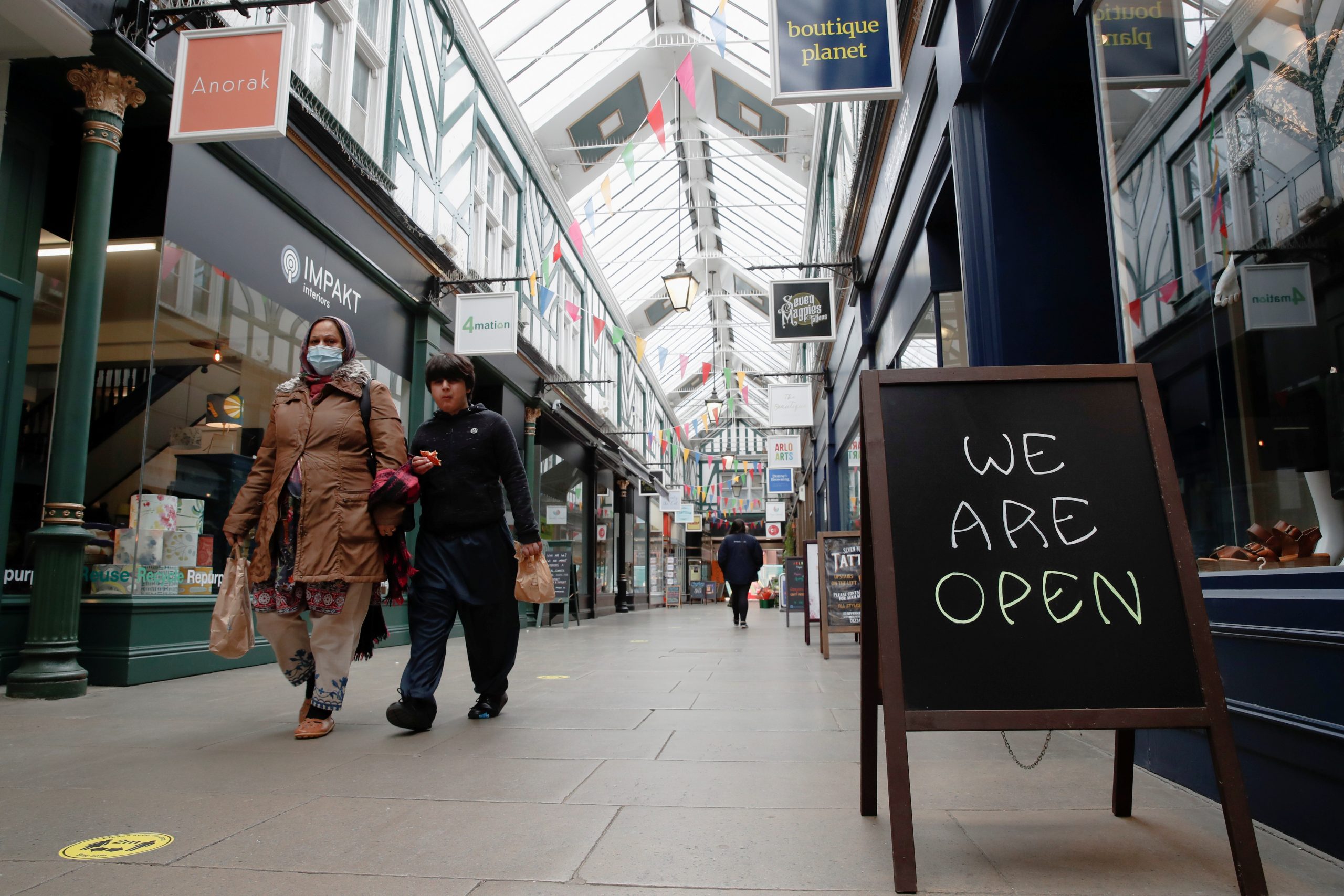  UK recovery quickens in April as economy posts record annual jump