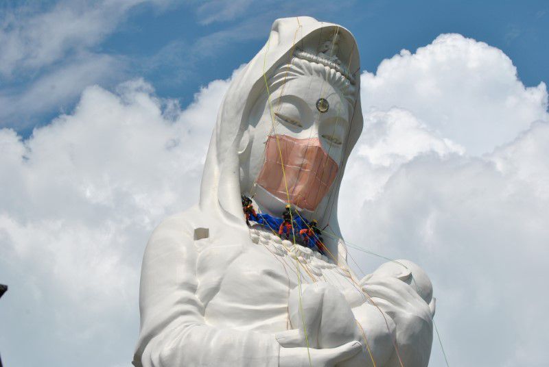  Giant Buddhist goddess in Japan gets face mask to pray for end of COVID-19