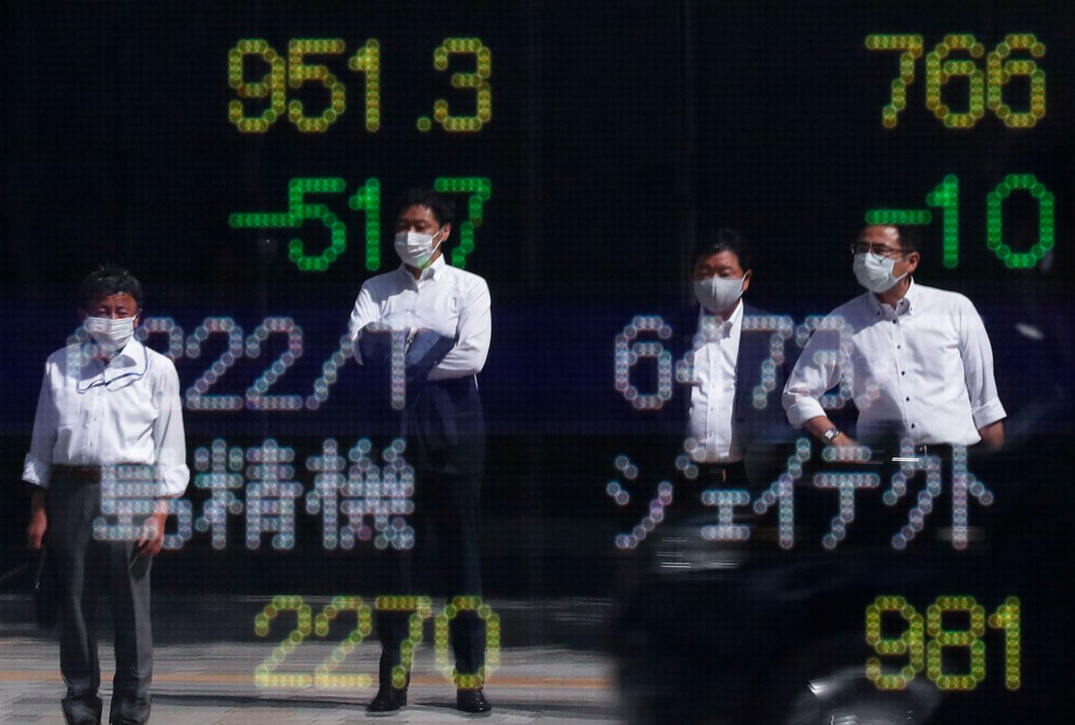  Stocks lurch lower, bonds jump as virus variant spooks investors