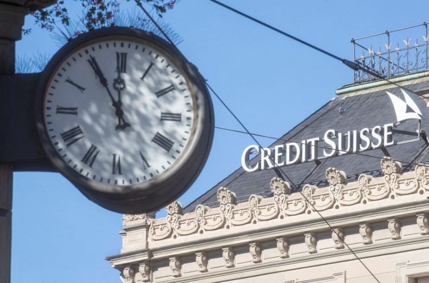  Credit Suisse pays down debt to calm investors